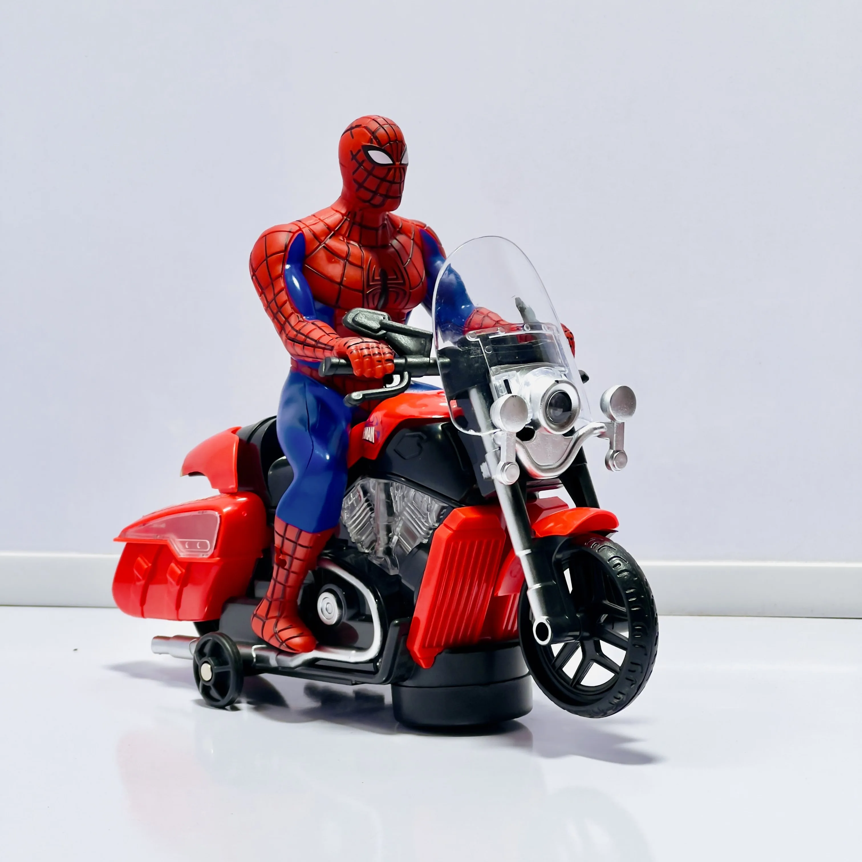 Spider-Man Battery Operated Bike Toy with Flashing Lights & Music – Bump & Go Motorcycle for Kids