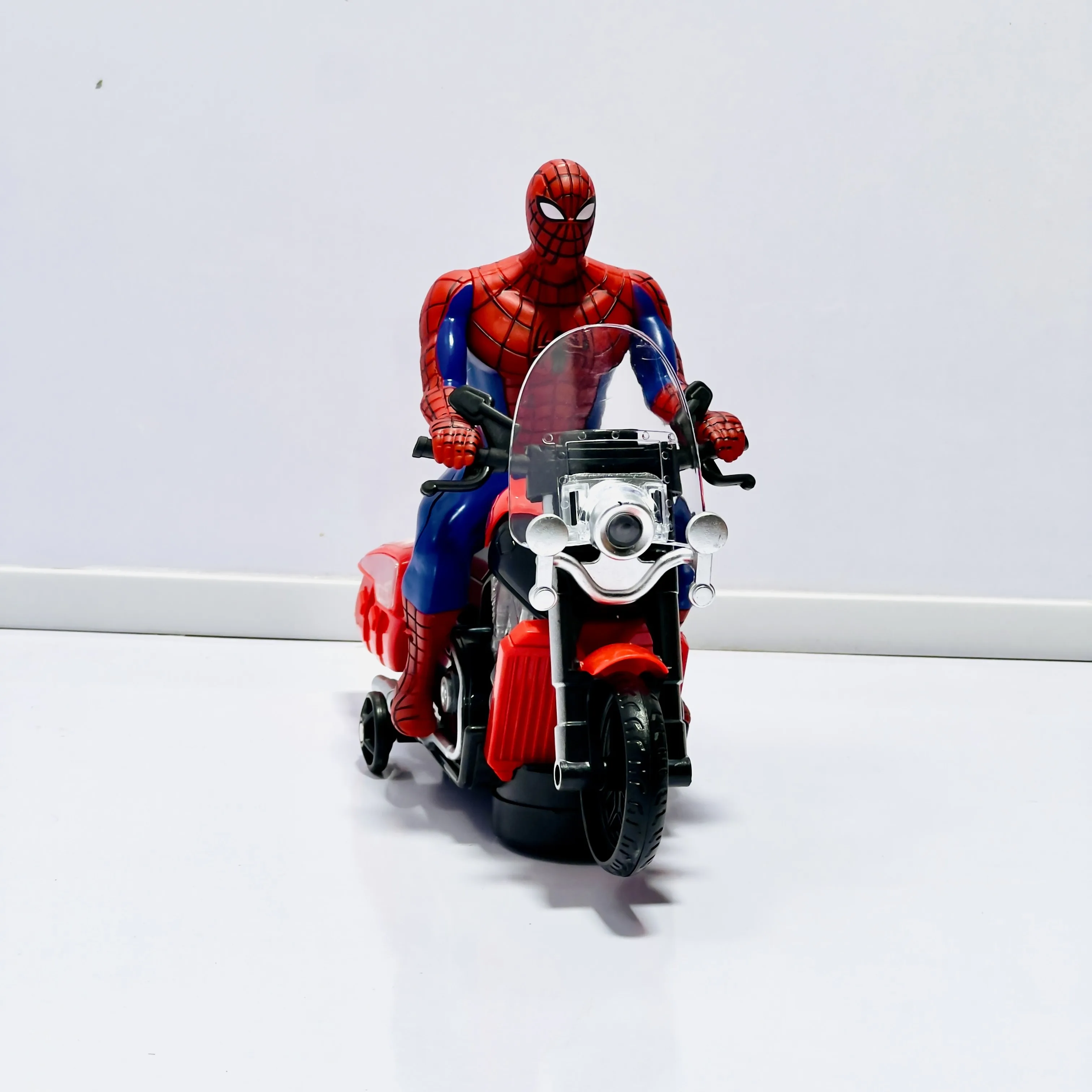 Spider-Man Battery Operated Bike Toy with Flashing Lights & Music – Bump & Go Motorcycle for Kids